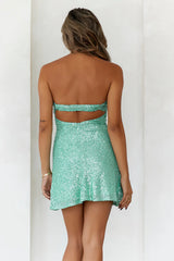 Sage green sequined mini skirt - the perfect dazzling outfit for a party