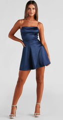 Satin V-neck A-line dress with criss-cross spaghetti straps.