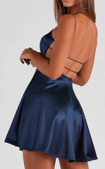 Satin V-neck A-line dress with criss-cross spaghetti straps.