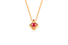 Ruby-embellished 18K rose gold necklace set, a symbol of enduring love.
