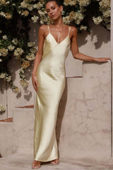 Party centerpiece: Backless, form-fitting, mermaid-style long evening dress